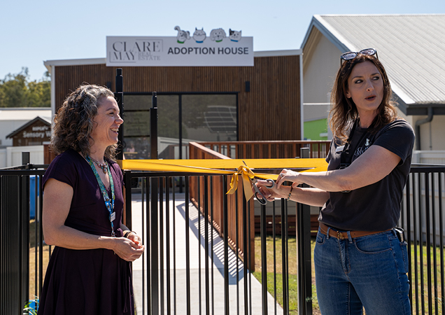 Clare May from Clare May Real Estate and RSPCA Qld CEO Emma Whitehead opening the tiny home.